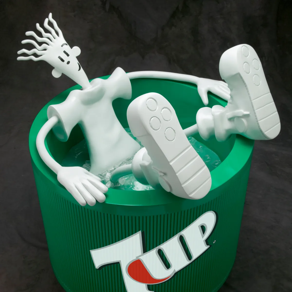 Figure in a 7Up cup