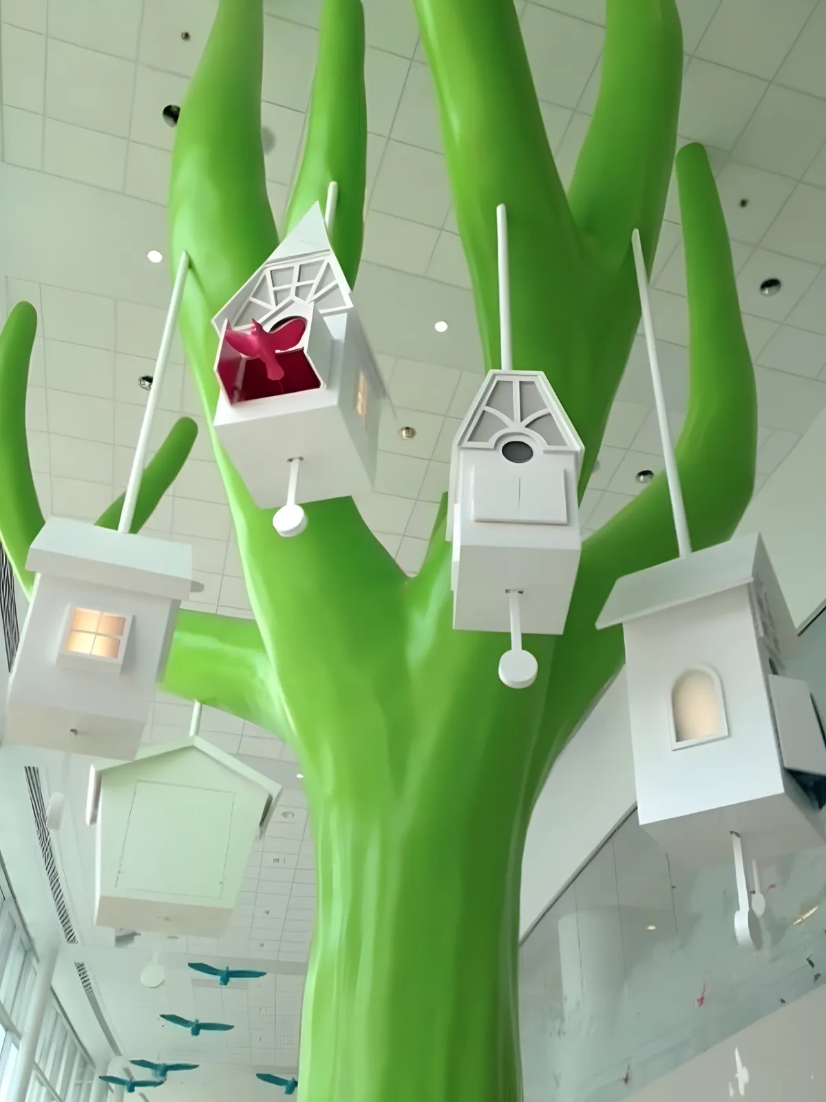 Children's Hospital tree with birdhouses hanging