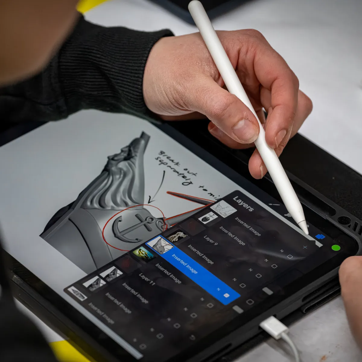 Artist working on tablet