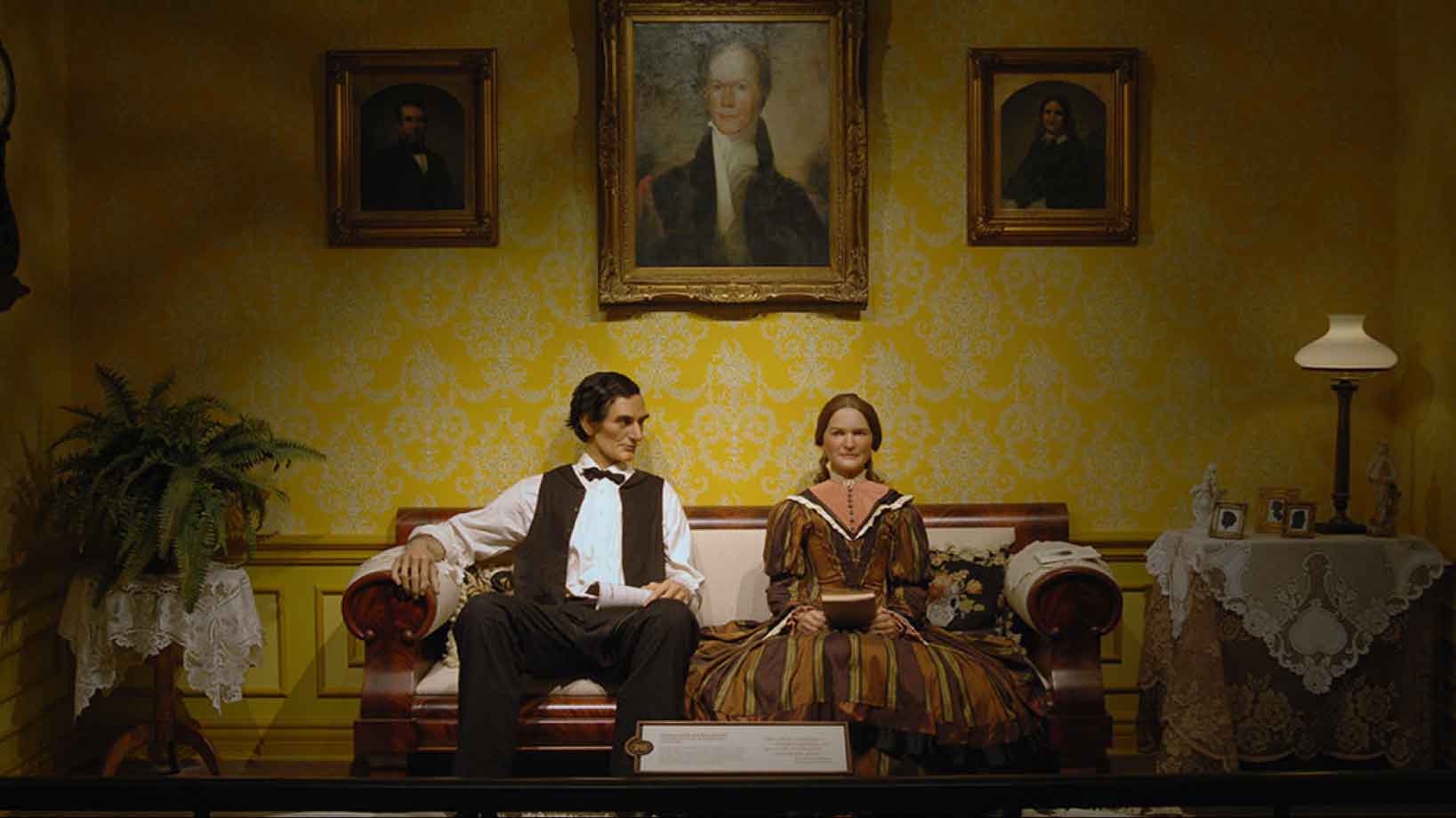 Abraham Lincoln sitting on couch with wife