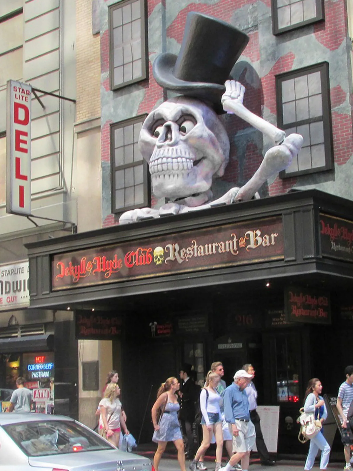 Jekyll & Hyde Club Restaurant and Bar sign with large skeleton tipping his top hat